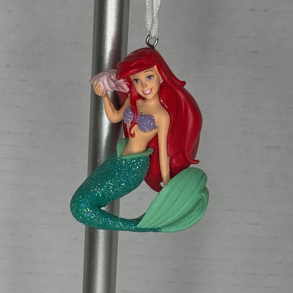 Disney Ariel Mermaid Ornament 3” holding a seashell sparkly outfit